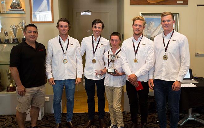 Sharp’s Ed Gaete presents the Australian Youth Match Racing Championship cup to the champions © CYCA Hamish Hardy